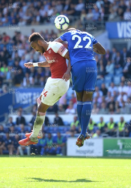 020918 - Cardiff City v Arsenal - Premier League - Pierre-Emerick Aubameyang of Arsenal and Souleymane Bamba of Cardiff City compete in the air