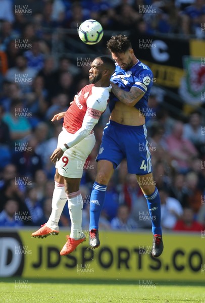 020918 - Cardiff City v Arsenal, Premier League - Sean Morrison of Cardiff City and Alexandre Lacazette of Arsenal compete for the ball