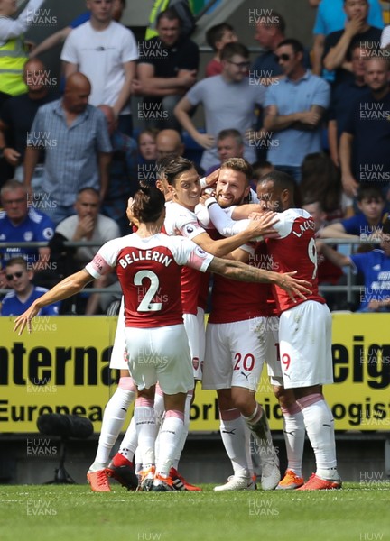 020918 - Cardiff City v Arsenal, Premier League - Arsenal players celebrate after Shkodran Mustafi of Arsenal, centre, scores the opening goal