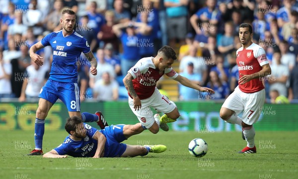 020918 - Cardiff City v Arsenal, Premier League - Lucas Torreira of Arsenal is brought down by Harry Arter of Cardiff City