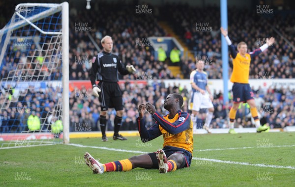 25.01.09 - Cardiff City v Arsenal - FA Cup - Arsenal's Emmanuel Eboue looks dejected after a missed chance. 