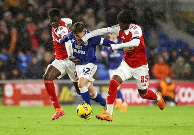 111125 - Cardiff City v Arsenal U21 - Vertu Trophy - Trey George of Cardiff City is challenged by Josiah King of Arsenal U21 