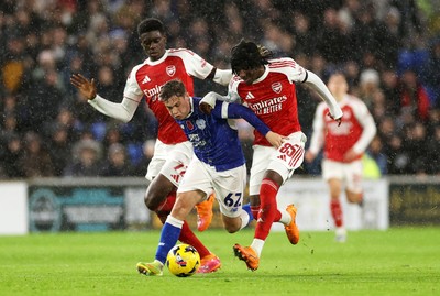 111125 - Cardiff City v Arsenal U21 - Vertu Trophy - Trey George of Cardiff City is challenged by Josiah King of Arsenal U21 