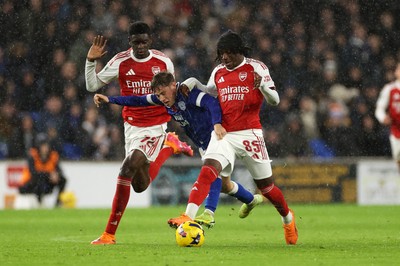 111125 - Cardiff City v Arsenal U21 - Vertu Trophy - Trey George of Cardiff City is challenged by Josiah King of Arsenal U21 