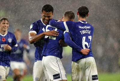 111125 - Cardiff City v Arsenal U21 - Vertu Trophy - Troy Perrett of Cardiff City celebrates scoring a goal with team mates