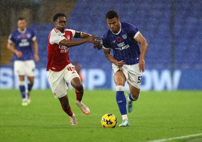 111125 - Cardiff City v Arsenal U21 - Vertu Trophy - T-Jay Parfitt of Cardiff City is challenged by Osman Kamara of Arsenal U21 