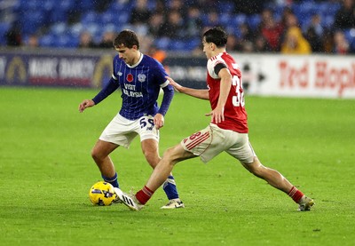 111125 - Cardiff City v Arsenal U21 - Vertu Trophy - Matthew Apter of Cardiff City is challenged by Louie Copley of Arsenal U21 