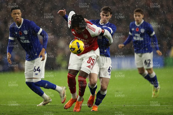 111125 - Cardiff City v Arsenal U21 - Vertu Trophy - Josiah King of Arsenal U21 is challenged by Cody Twose of Cardiff City 