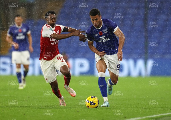 111125 - Cardiff City v Arsenal U21 - Vertu Trophy - T-Jay Parfitt of Cardiff City is challenged by Osman Kamara of Arsenal U21 