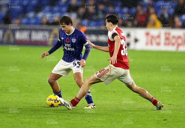 111125 - Cardiff City v Arsenal U21 - Vertu Trophy - Matthew Apter of Cardiff City is challenged by Louie Copley of Arsenal U21 