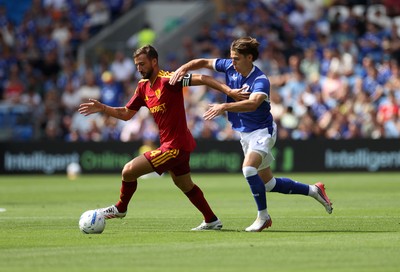 010826 - Cardiff City v AS Roma - Pre Season Friendly - Bryan Cristante of Roma is tackled by Cian Ashford of Cardiff 