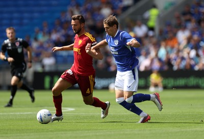 010826 - Cardiff City v AS Roma - Pre Season Friendly - Bryan Cristante of Roma is tackled by Cian Ashford of Cardiff 