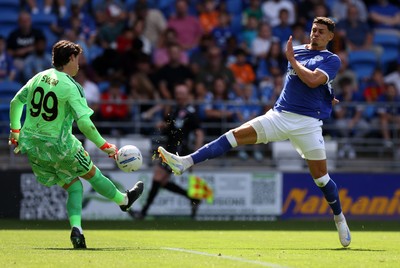 010826 - Cardiff City v AS Roma - Pre Season Friendly - Yousef Salech of Cardiff gets the ball past keeper Mile Svilar of Roma to score a goal