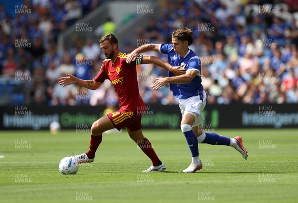010826 - Cardiff City v AS Roma - Pre Season Friendly - Bryan Cristante of Roma is tackled by Cian Ashford of Cardiff 