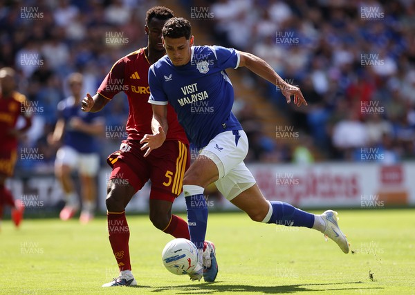 010826 - Cardiff City v AS Roma - Pre Season Friendly - Yousef Salech of Cardiff is challenged by Evan Ndicka of Roma 