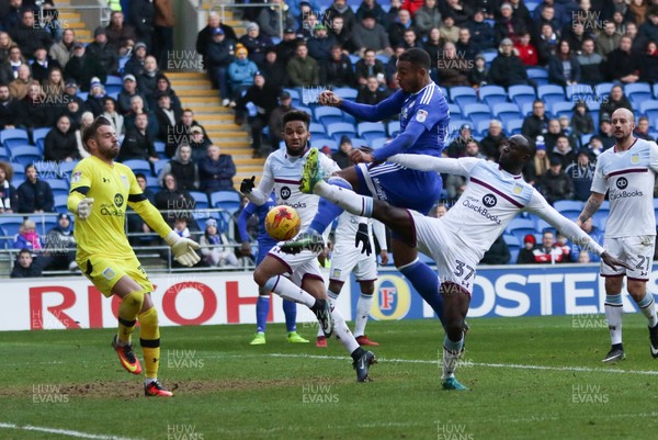 020117 - Cardiff City v Aston Villa, Sky Bet Championship - Kenneth Zohore of Cardiff City is denied a goal by the challenge of Aston Villa goalkeeper Mark Bunn and Albert Adomah of Aston Villa by Gareth Everett