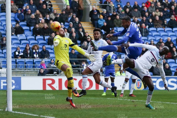 020117 - Cardiff City v Aston Villa, Sky Bet Championship - Kenneth Zohore of Cardiff City is denied a goal by the challenge of Aston Villa goalkeeper Mark Bunn and Albert Adomah of Aston Villa by Gareth Everett