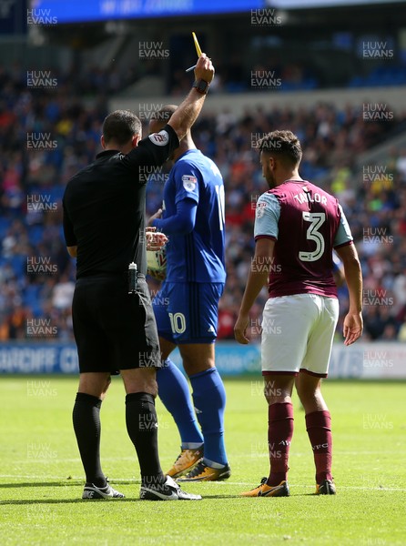 120817 - Cardiff City v Aston Villa - SkyBet Championship - Neil Taylor of Aston Villa is given a yellow card for his tackle on Nathaniel Mendez-Laing of Cardiff City