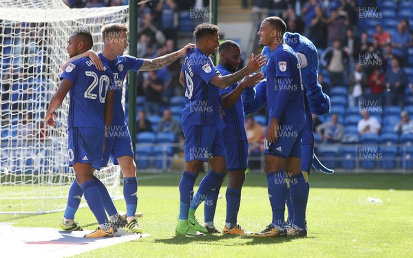 120817 - Cardiff City v Aston Villa - SkyBet Championship - Junior Hoilett of Cardiff City celebrates with team mates after scoring a goal