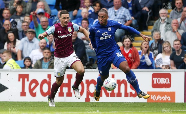 120817 - Cardiff City v Aston Villa - SkyBet Championship - Kenneth Zohore of Cardiff City is challenged by James Chester of Aston Villa