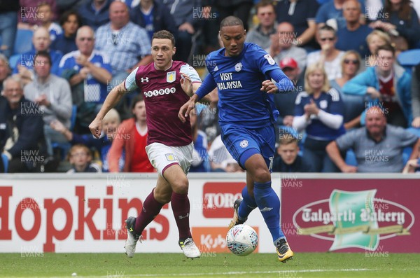 120817 - Cardiff City v Aston Villa - SkyBet Championship - Kenneth Zohore of Cardiff City is challenged by James Chester of Aston Villa