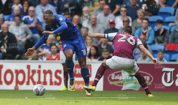 120817 - Cardiff City v Aston Villa - SkyBet Championship - John Terry of Aston Villa gives away a free kick with his tackle on Kenneth Zohore of Cardiff City
