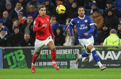 270126 - Cardiff City v Barnsley, EFL Sky Bet League 1 - Chris Willock of Cardiff City and Tennai Watson of Barnsley compete for the ball