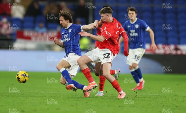 270126 - Cardiff City v Barnsley, EFL Sky Bet League 1 - Ryan Wintle of Cardiff City gets away from Patrick Kelly of Barnsley