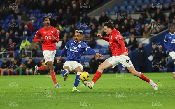 270126 - Cardiff City v Barnsley, EFL Sky Bet League 1 - Callum Robinson of Cardiff City fires a shot at goal which hits the underside of the crossbar