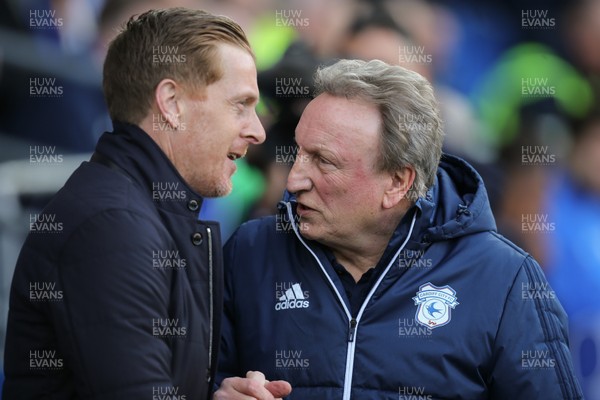 100318 - Cardiff City v Birmingham City, Sky Bet Championship - Birmingham City manager Garry Monk, left, with Cardiff City manager Neil Warnock at the start of the match
