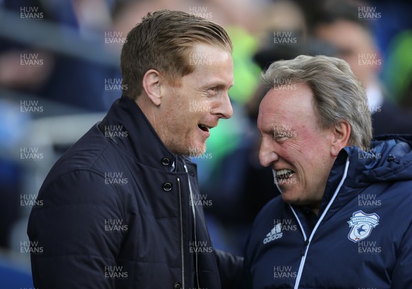 100318 - Cardiff City v Birmingham City, Sky Bet Championship - Birmingham City manager Garry Monk, left, with Cardiff City manager Neil Warnock at the start of the match
