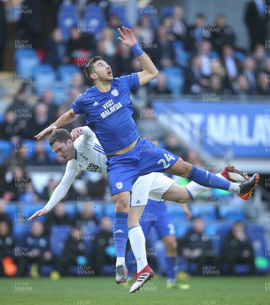 100318 - Cardiff City v Birmingham City, Sky Bet Championship - Marko Grujic of Cardiff City and Craig Gardner of Birmingham City compete for the ball