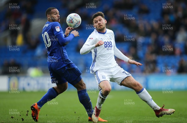 100318 - Cardiff City v Birmingham City, Sky Bet Championship - Kenneth Zohore of Cardiff City and Harlee Dean of Birmingham City compete for the ball