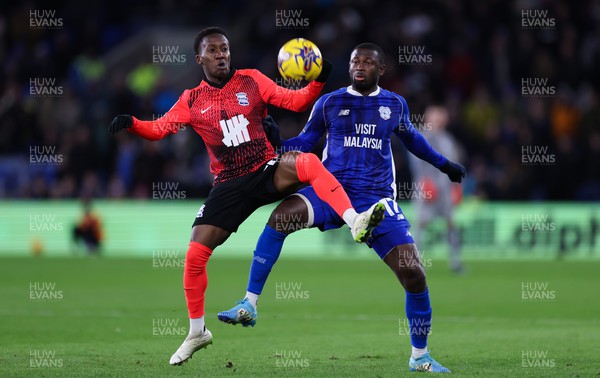 131223 - Cardiff City v Birmingham City, EFL Sky Bet Championship - Siriki Dembele of Birmingham City and Jamilu Collins of Cardiff City compete for the ball