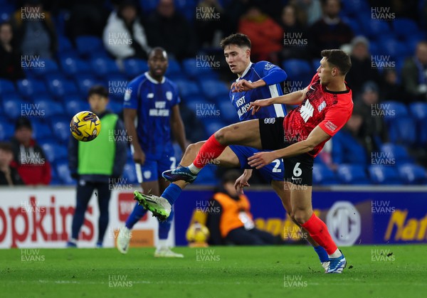 131223 - Cardiff City v Birmingham City, EFL Sky Bet Championship - Rubin Colwill of Cardiff City and Krystian Bielik of Birmingham City compete for the ball