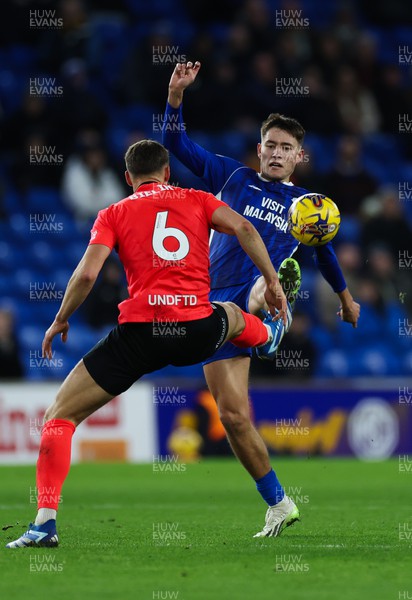 131223 - Cardiff City v Birmingham City, EFL Sky Bet Championship - Rubin Colwill of Cardiff City and Krystian Bielik of Birmingham City compete for the ball