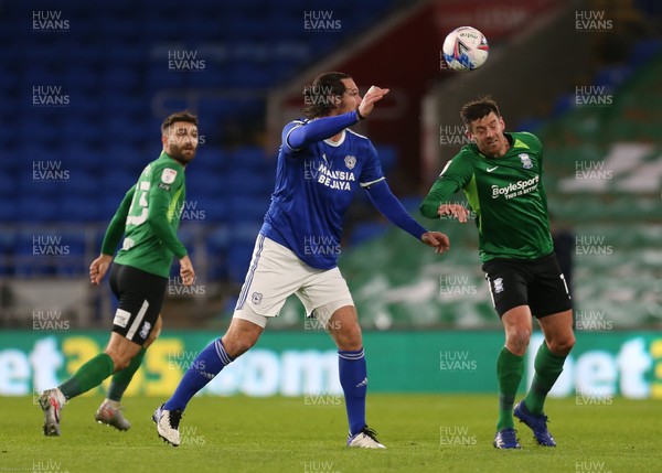 161220 - Cardiff City v Birmingham City, Sky Bet Championship - Sean Morrison of Cardiff City and Lukas Jutkiewicz of Birmingham City compete for the ball