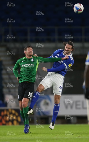 161220 - Cardiff City v Birmingham City, Sky Bet Championship - Sean Morrison of Cardiff City and Lukas Jutkiewicz of Birmingham City compete for the ball