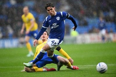 241026 - Cardiff City v Birmingham City - Sky Bet Championship - Cian Ashford of Cardiff City is challenged by Phil Neumann of Birmingham City