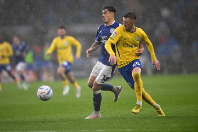 241026 - Cardiff City v Birmingham City - Sky Bet Championship - Jay Stansfield of Birmingham City is challenged by Alex Robertson of Cardiff City