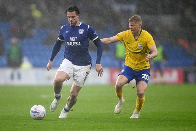 241026 - Cardiff City v Birmingham City - Sky Bet Championship - Ollie Tanner of Cardiff City is challenged by Alex Cochrane of Birmingham City