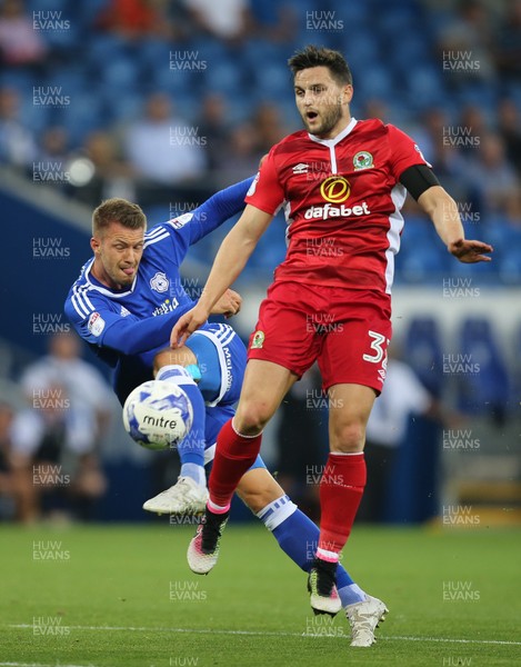 170816 - Cardiff City v Blackburn, Sky Bet Championship - Anthony Pilkington of Cardiff City and Craig Conway of Blackburn compete to win the ball