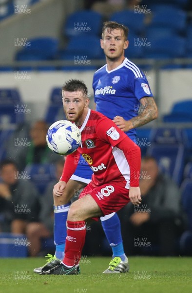 170816 - Cardiff City v Blackburn, Sky Bet Championship - Joe Ralls of Cardiff City plays the ball past Jack Byrne of Blackburn