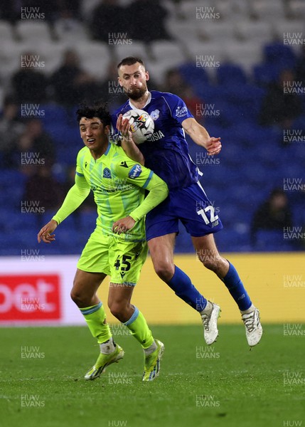 200224 - Cardiff City v Blackburn Rovers - SkyBet Championship - Nathaniel Phillips of Cardiff City is challenged by Ben Chrisene of Blackburn 