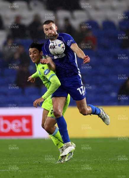 200224 - Cardiff City v Blackburn Rovers - SkyBet Championship - Nathaniel Phillips of Cardiff City is challenged by Ben Chrisene of Blackburn 