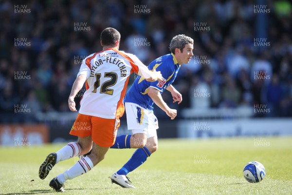 12.04.08 .. Cardiff City v Blackpool, Coca Cola Championship Cardiff's Kevin McNaughton takes on Blackpool's Gary Taylor-Fletcher  