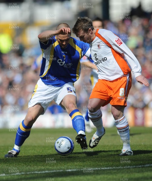 12.04.08 - Championship Football Cardiff City v Blackpool Cardiff's Darren Purse and Blackpool's Stephen McPhee compete 