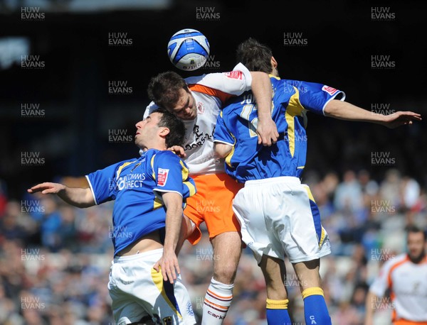 12.04.08 - Championship Football Cardiff City v Blackpool Blackpool's Ben Burgess  gets to a high ball 