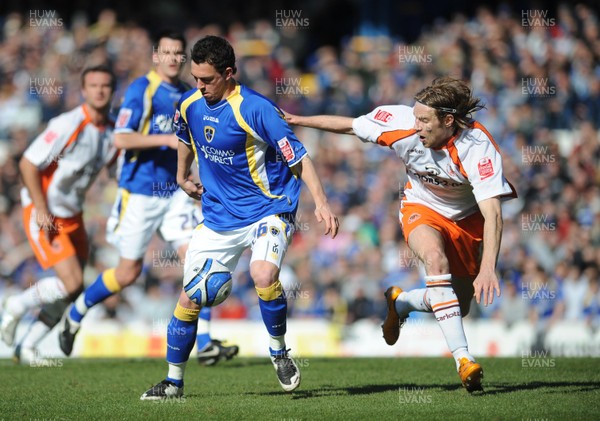 12.04.08 - Championship Football Cardiff City v Blackpool Cardiff's Jon Brown tries to get past Blackpool's Kaspars Gorkss  