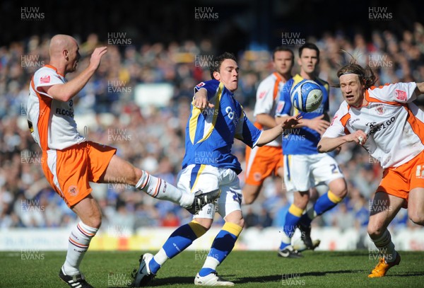 12.04.08 - Championship Football Cardiff City v Blackpool Cardiff's Jon Brown tries to get past Blackpool's Stephen Crainey and Kaspars Gorkss  